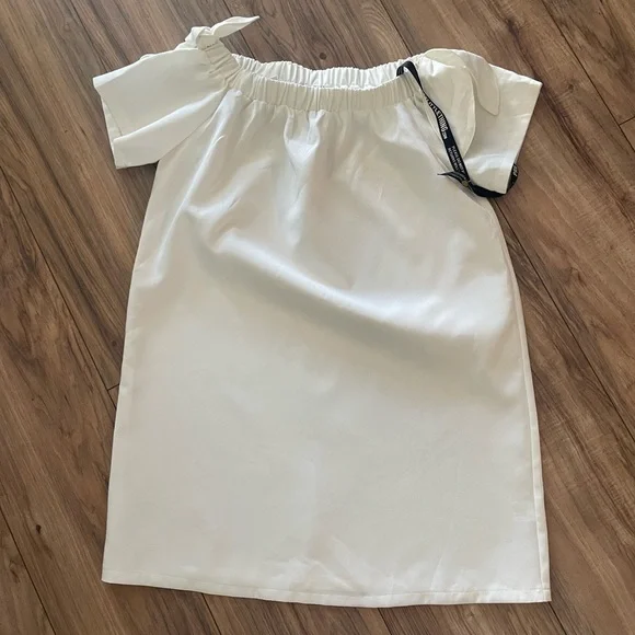 white off the shoulder dress pretty little thing Petite Cream Slinky Twist Shoulder Maxi Dress Pretty Little Thing